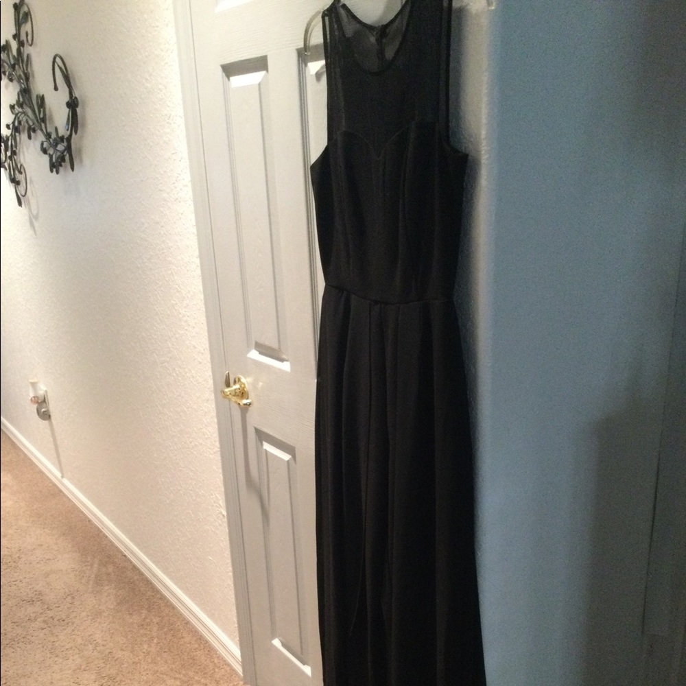 Black jumpsuit with chiffon.